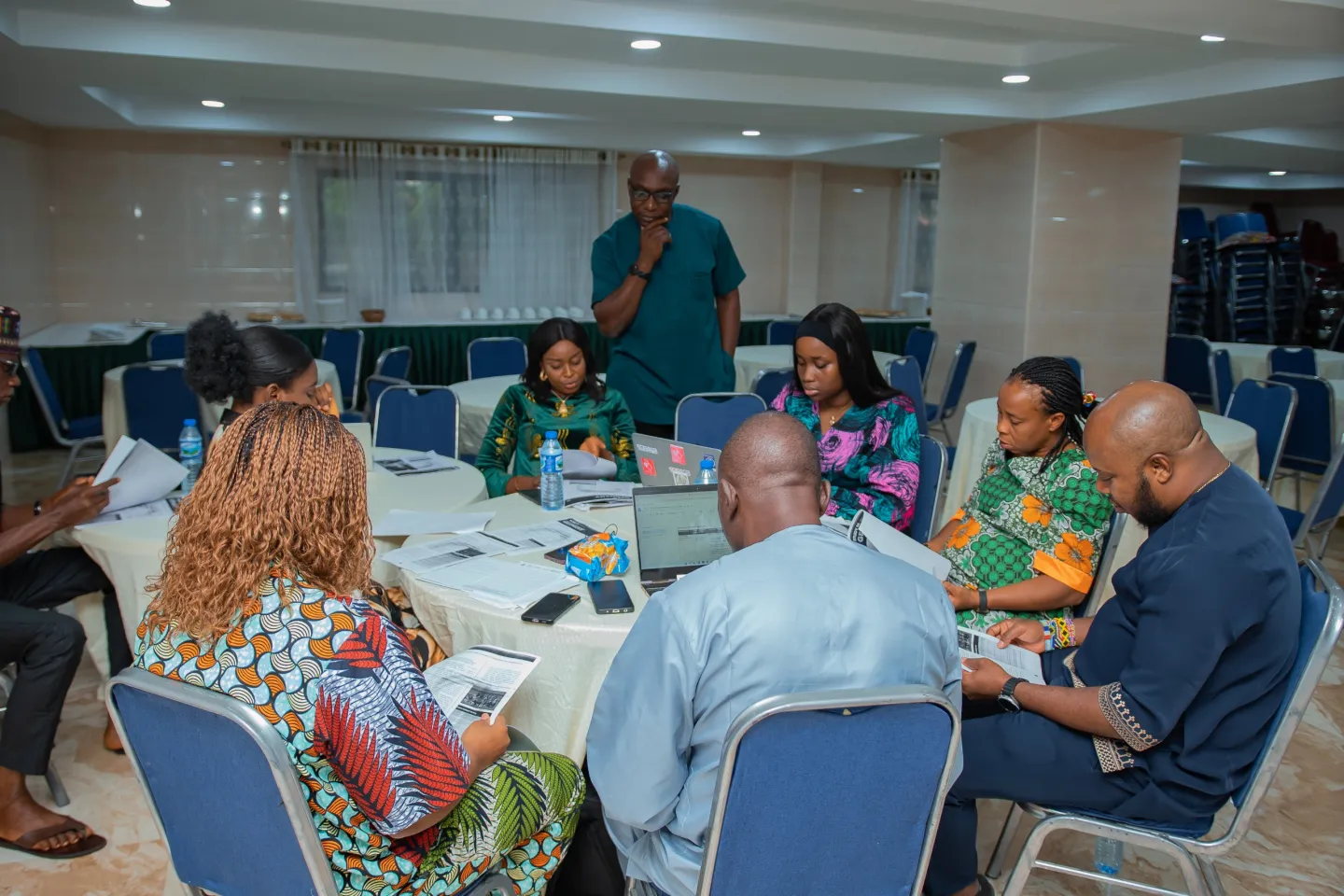 Participants seated around a table during a workshop