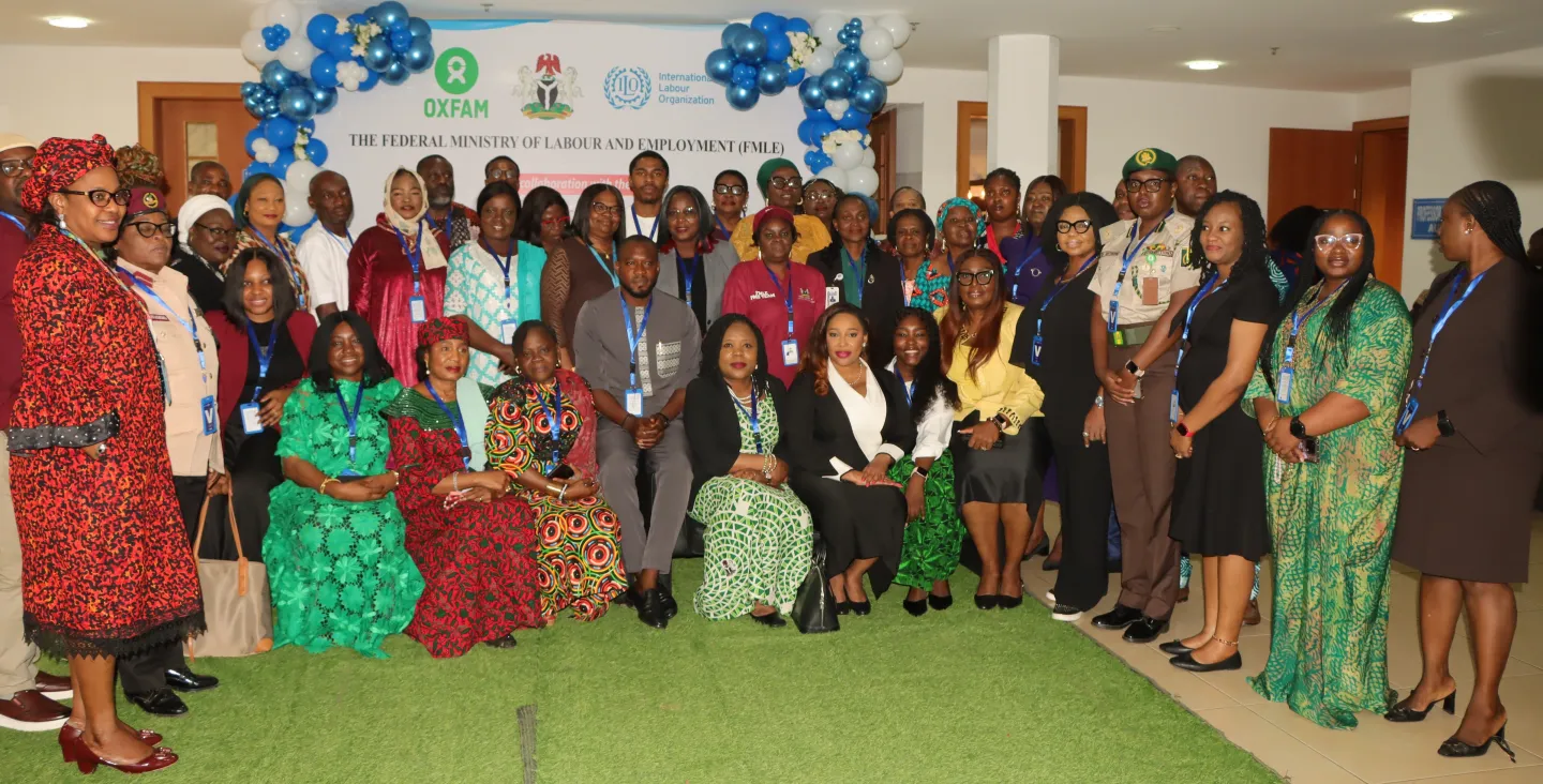 A large group of participants, including representatives from government agencies, trade unions, employers’ organizations, civil society, and development partners, gathered for a group photo.