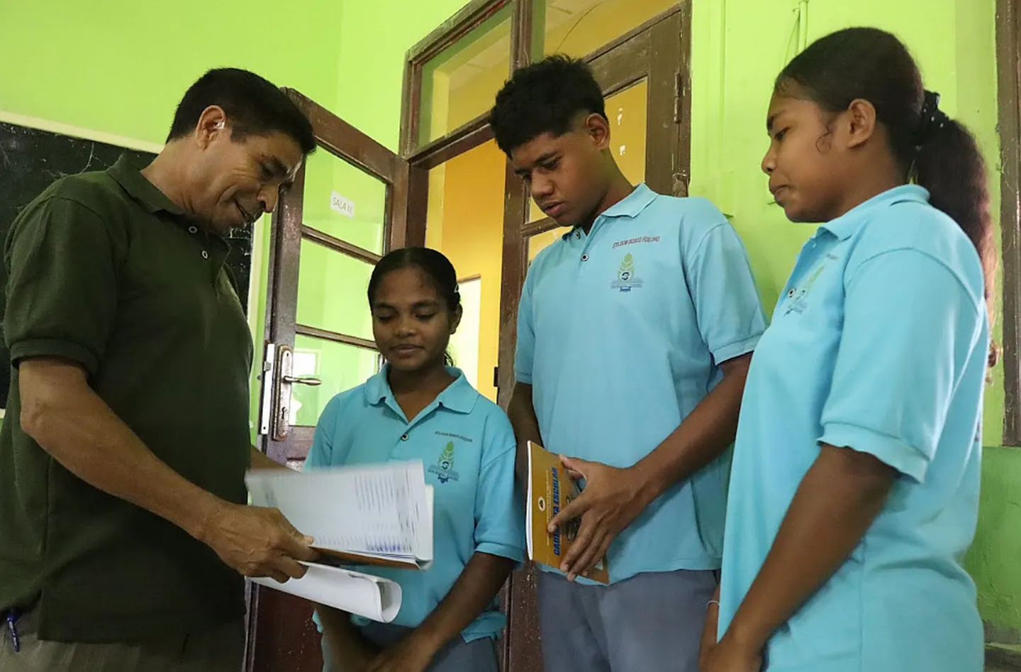 Four people standing