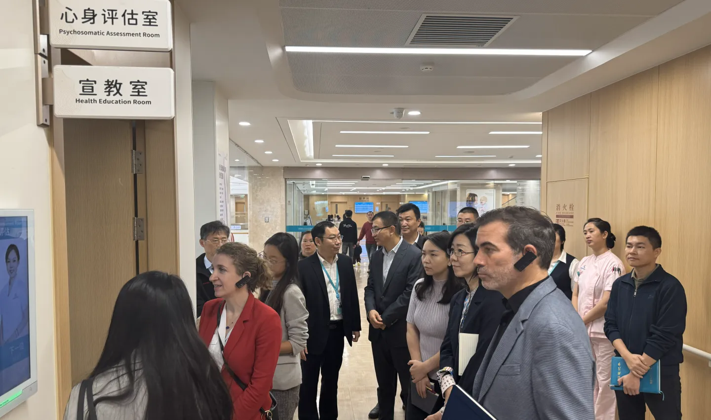 The delegates visit the local hospital and understand the the practical implementation of maternity insurance, Haikou, China, December 2025