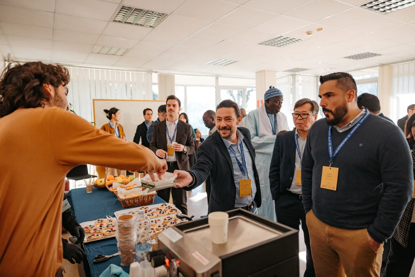 Participants during a coffee break, with catering provided by a local social enterprise. 