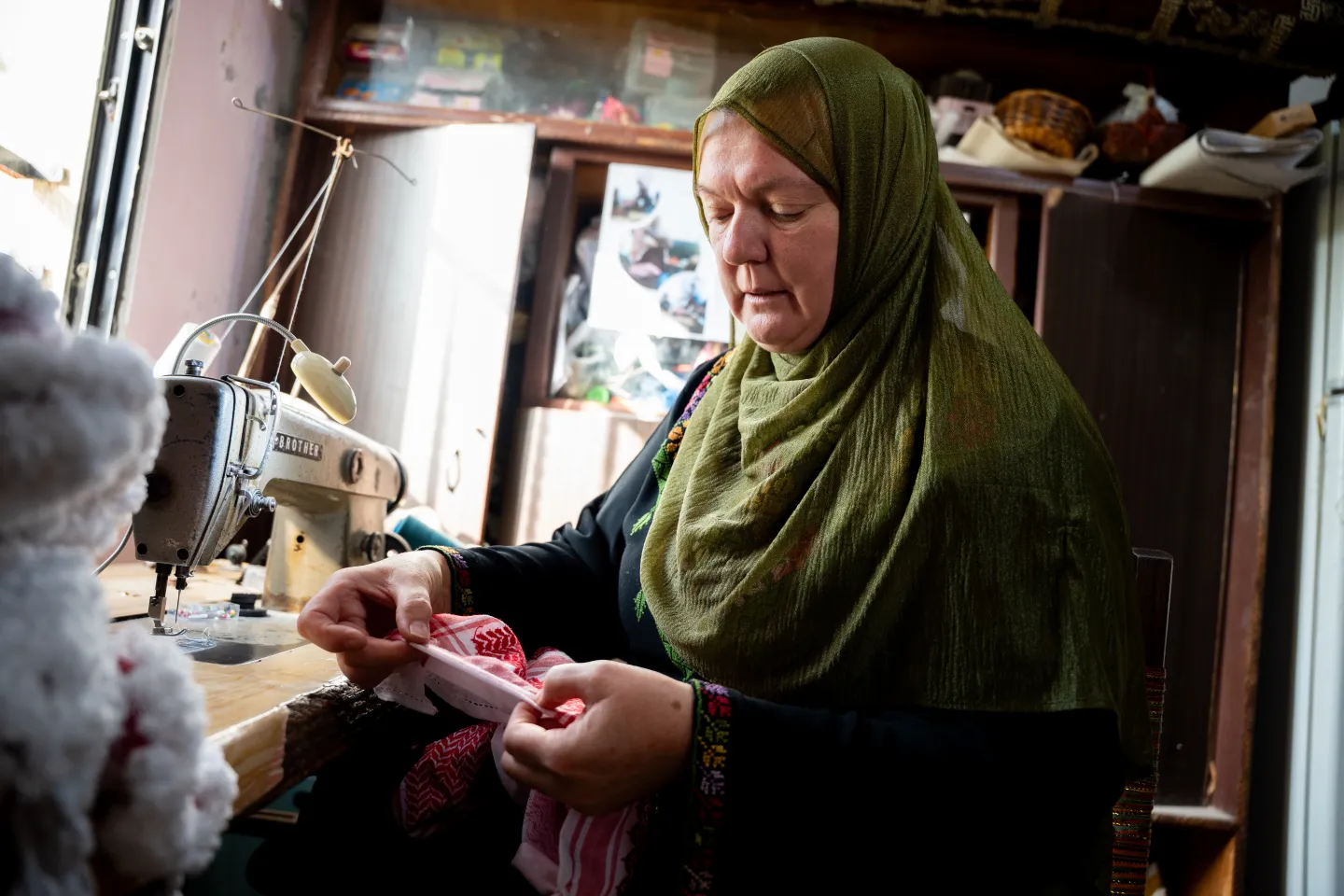 woman working on awqing machine