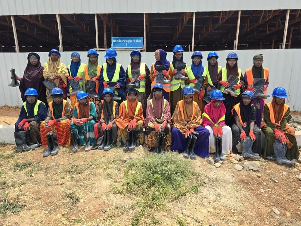 A group of women who trained in stone cobbling