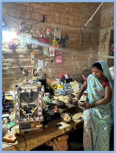 Woman in India in her electronics shop