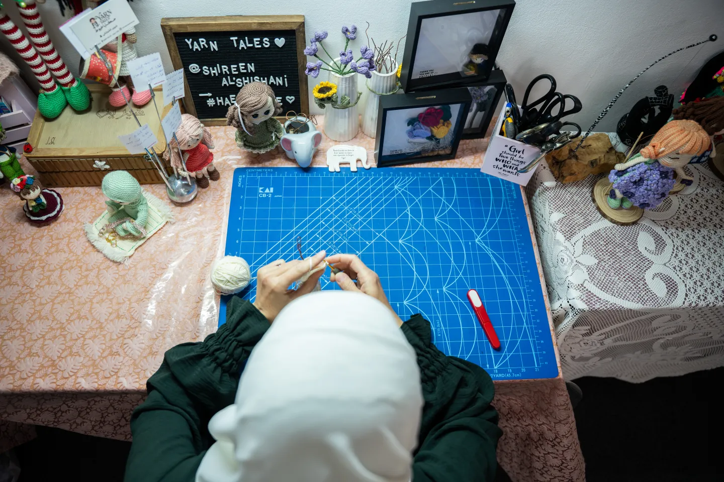woman doing paper cutting work