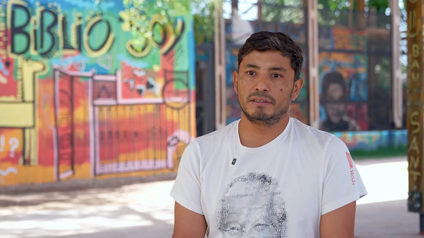 Waldemar Cubilla stands within La Carcova Popular Library, a transformative sanctuary he founded in José León Suárez to provide children with a safe, dignified refuge from child labour.