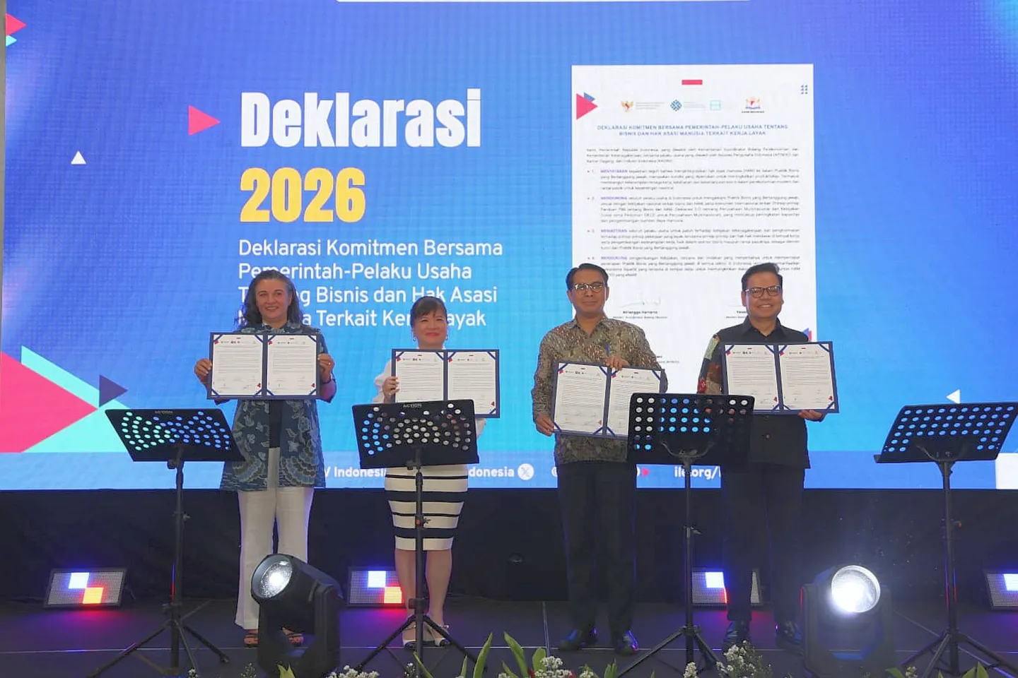 Four people standing