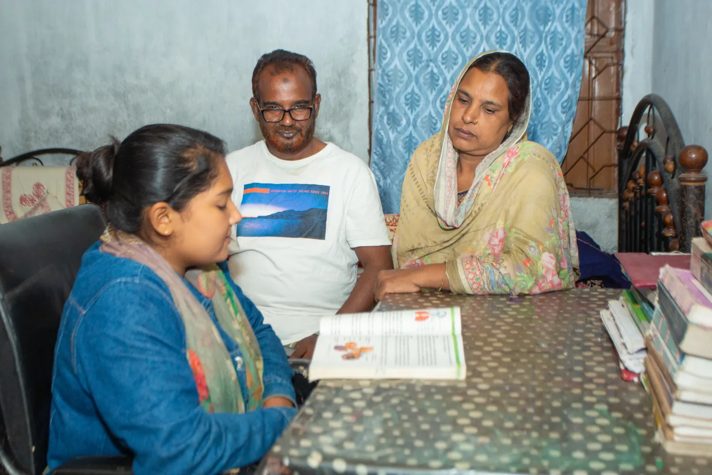 Abdul Mannan with his wife and daughter spending quality time