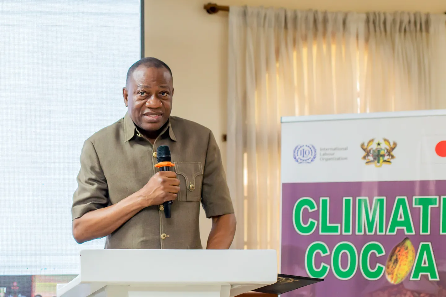 Dr Abdul-Rashid Pelpuo, Ghana’s Minister of Labour, Jobs and Employment, speaks at the national closure event of the CLIMATE-Cocoa Project in Accra.