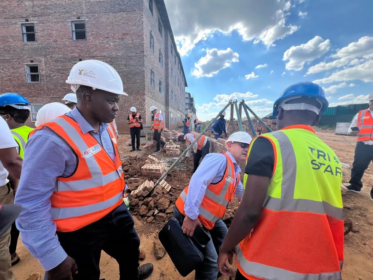 Delegates at construction site
