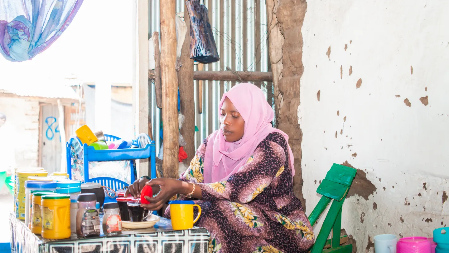 a woman entrepreneur inside her shop in Kenya
