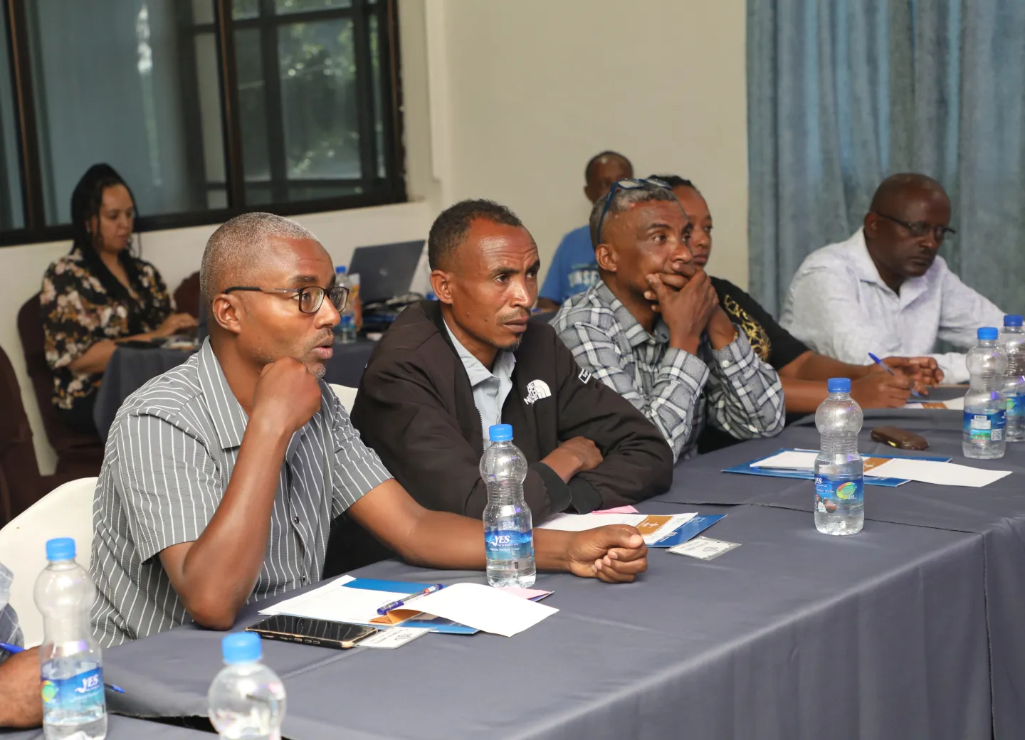 Participants actively participating in the discussion.