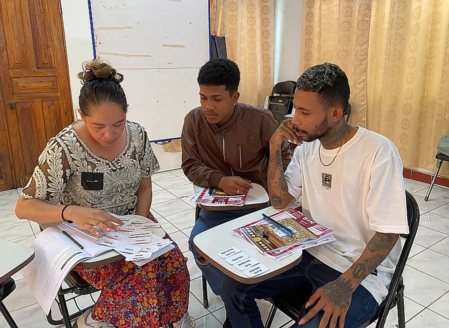 Three people sitting