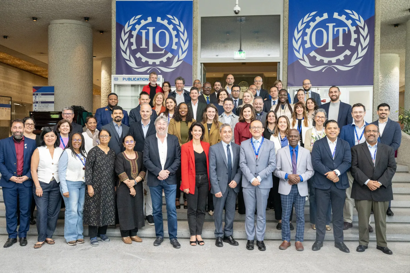 Participants are gathered for a group photo taken in ILO headquaters