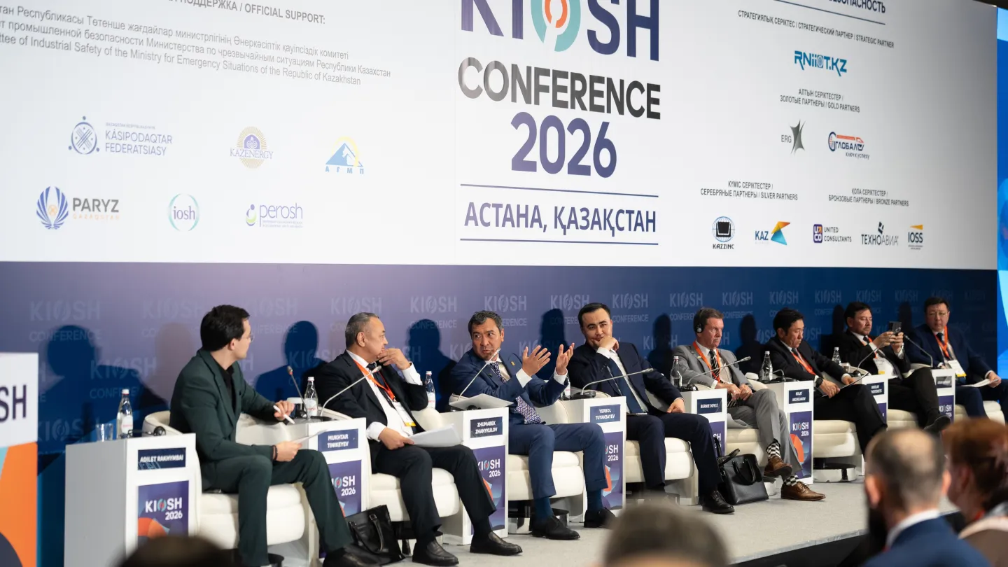 Panel of speakers facing the audience