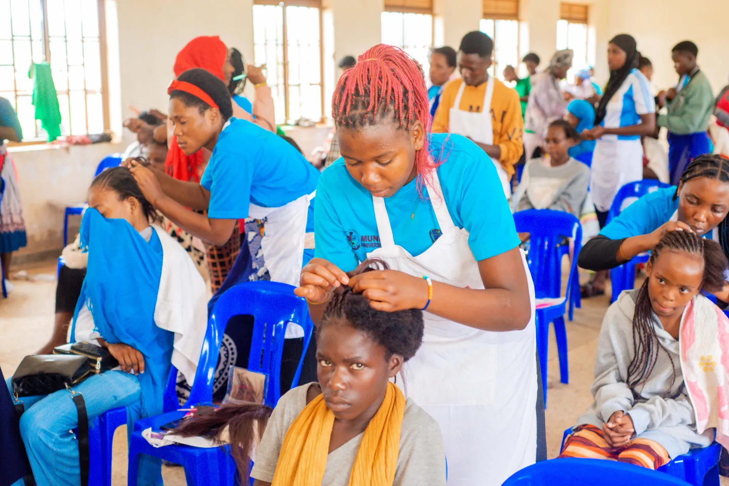Hairdressing course students practicing