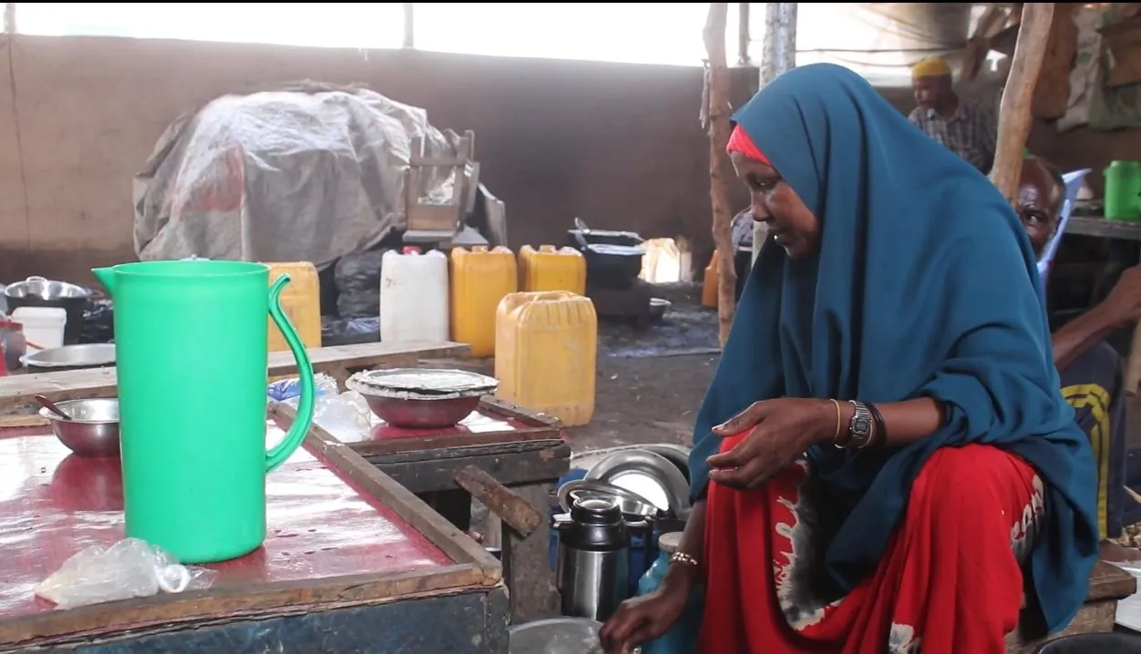 Woman working in a tea stall 