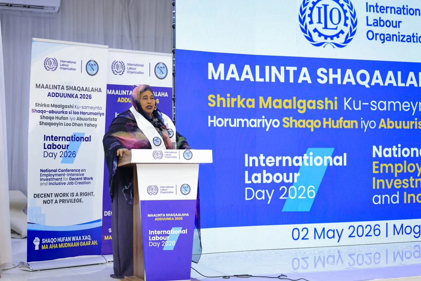 The Acting Minister of Labour and Social Affairs of Somalia addresses the conference audience from the podium
