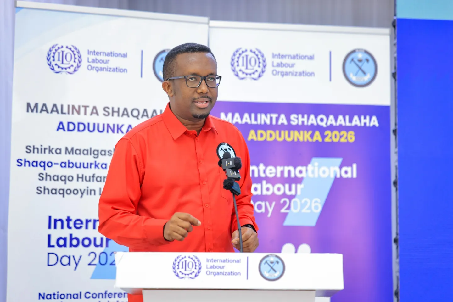 FESTU Secretary General delivering a speech to the conference audience.