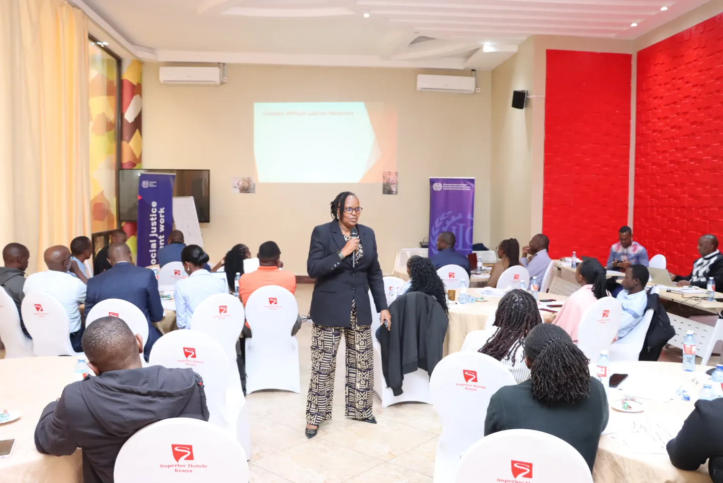 Irene Karanja, Director of Occupational Safety and Health Services and workshop facilitator, leads a training session during the OSH Training of Trainers workshop in Kenya.
