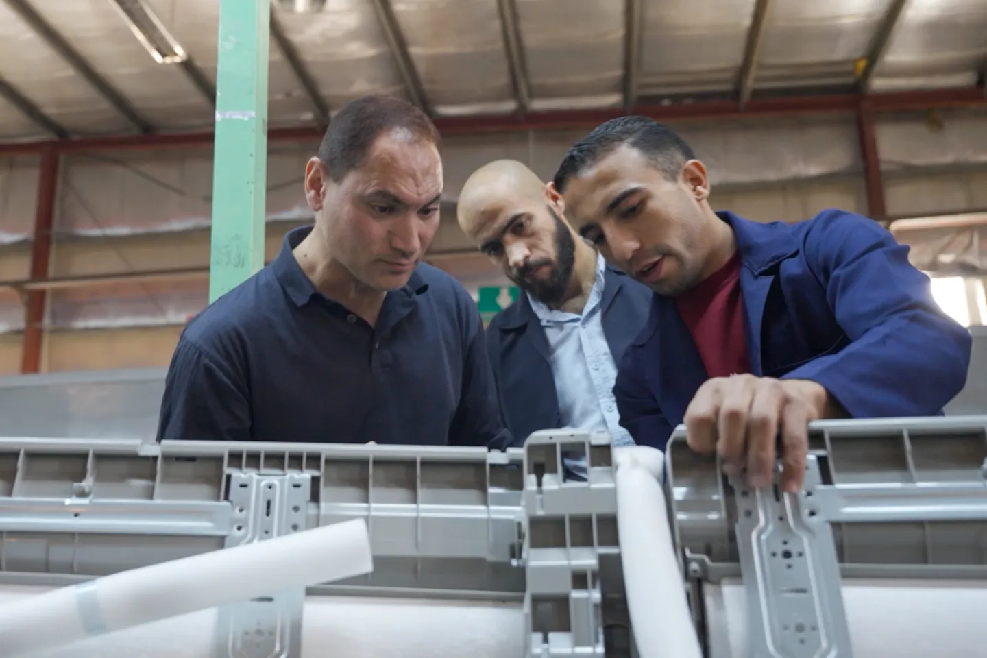 Mohamed Moad (left) during technical training in appliance repair, gaining skills that can be applied both locally and in future reconstruction efforts in Syria. Amman, Jordan, September 15, 2025. 