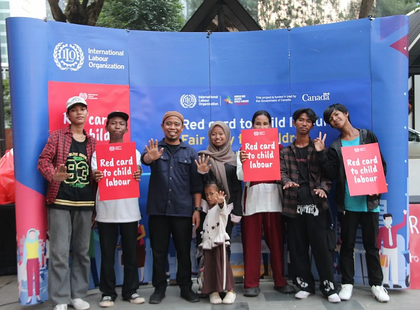 Eight people standing