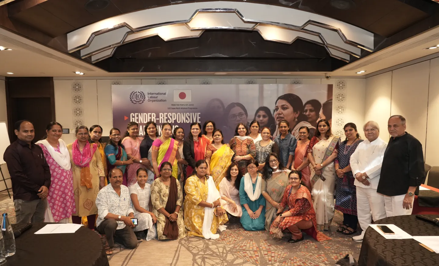 The participants pose for a group photo at a workshop.