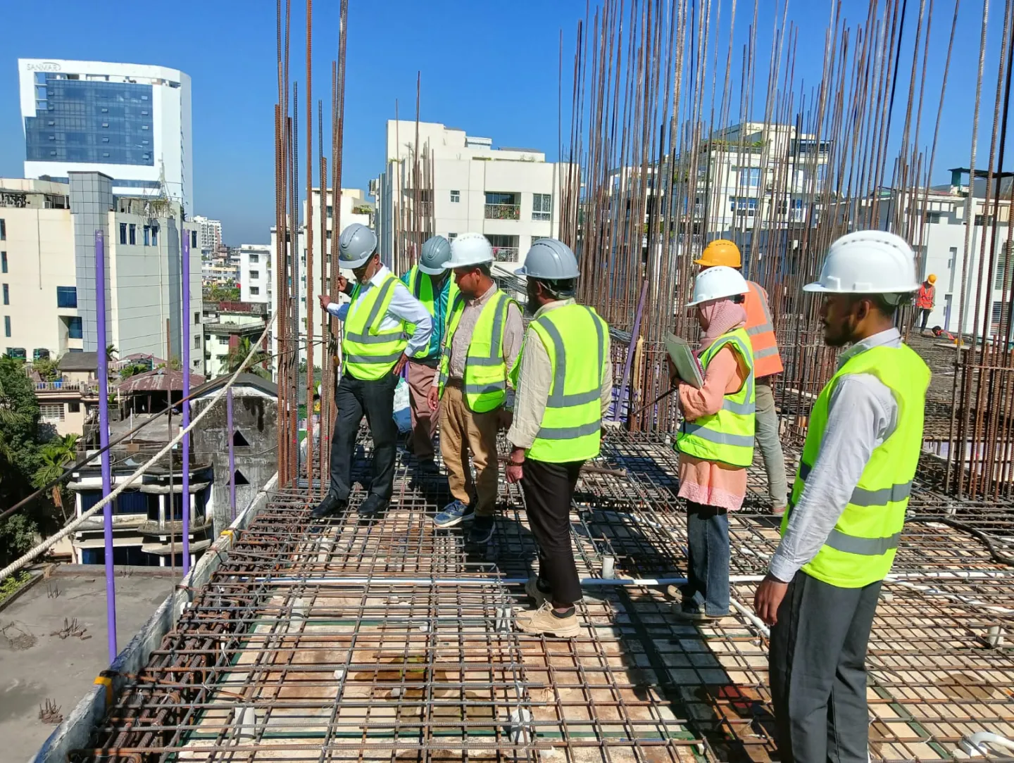 Marzan at work on a construction site, applying the skills she gained through her training