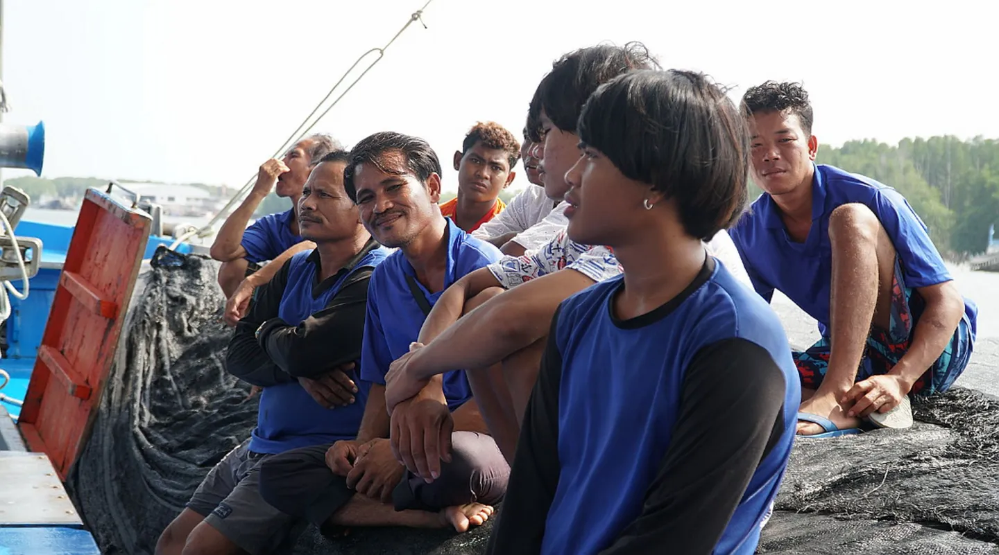 A group of people sitting 