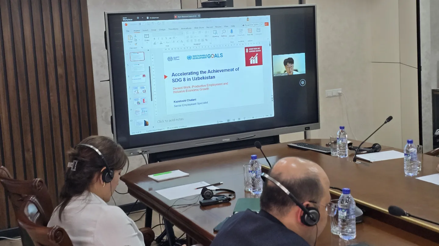 Photo of a screen displaying a presentation