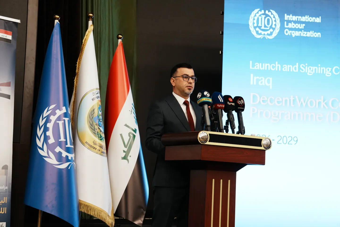 Khaled Al-Sayegh, Deputy Minister of Labor and Social Affairs in Iraq, delivers his opening speech during the launch of the National Decent Work Program in Iraq 2026-2029