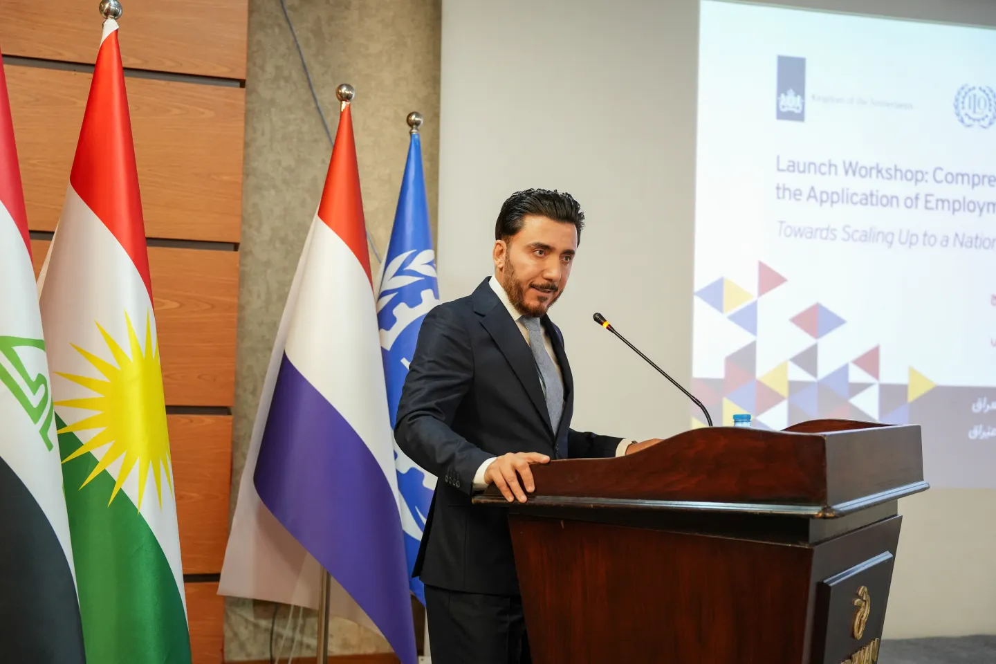 Ahmed Mohammed Hassan Al-Farraji, Head of the Experts Team at the Ministry of Planning, speaking at the launch of the EIIP Guidelines.