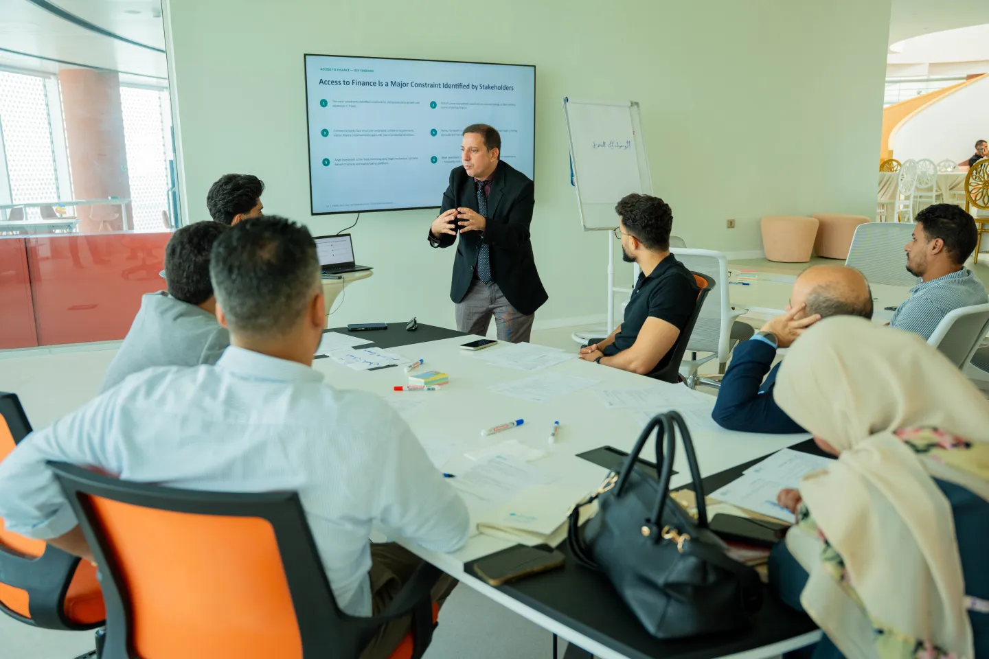 Participants discuss during a working session on Tripoli’s entrepreneurship ecosystem.