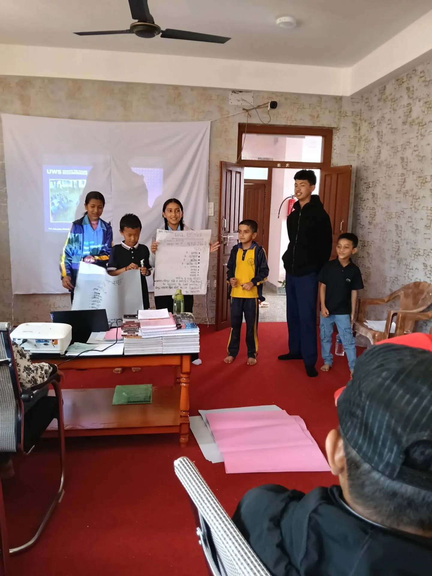 Children taking part in child clubs, school activities, and community awareness initiatives in Pauwadungma Rural Municipality, Koshi Province, Nepal.