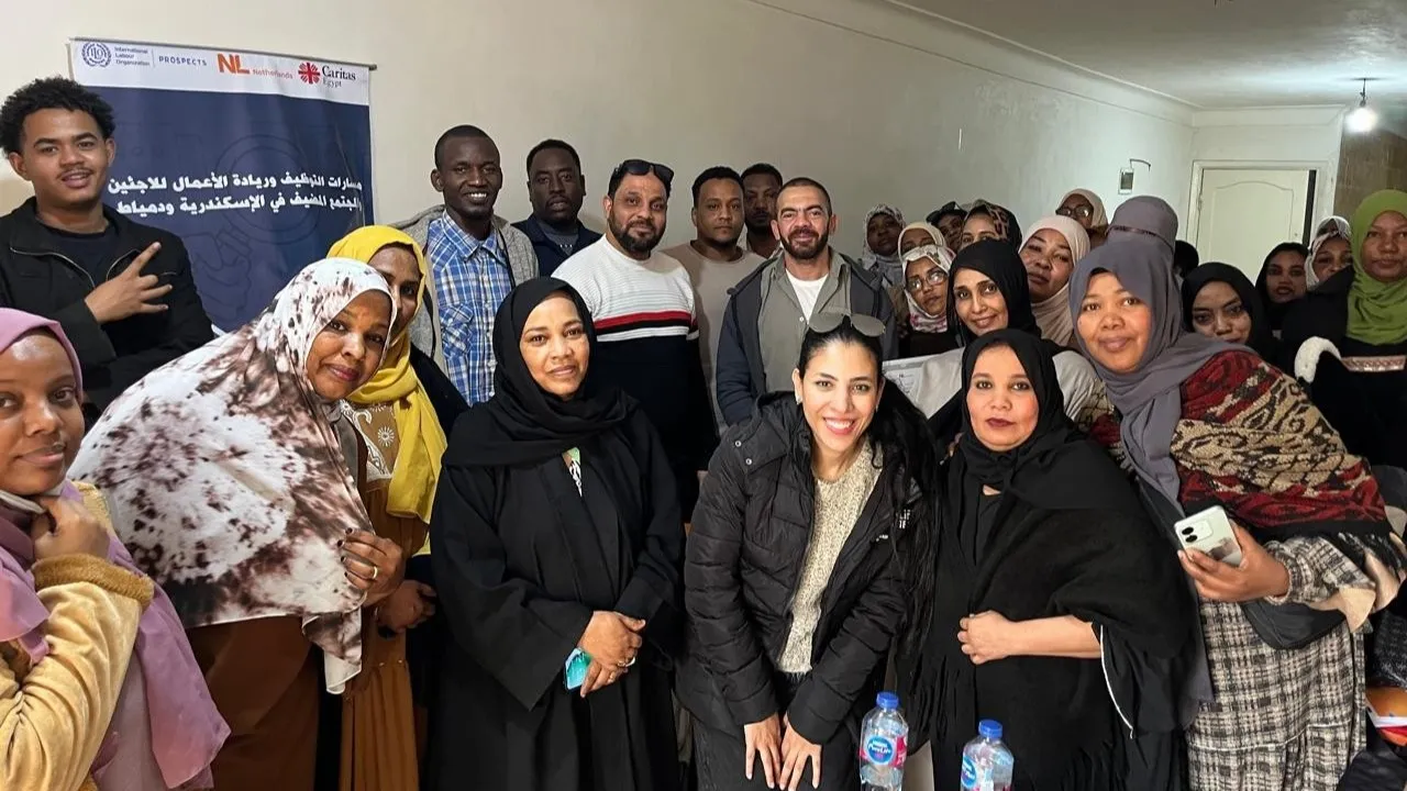 A group photo of participants in an ILO business training programme in Egypt, including Alhassan Ali.