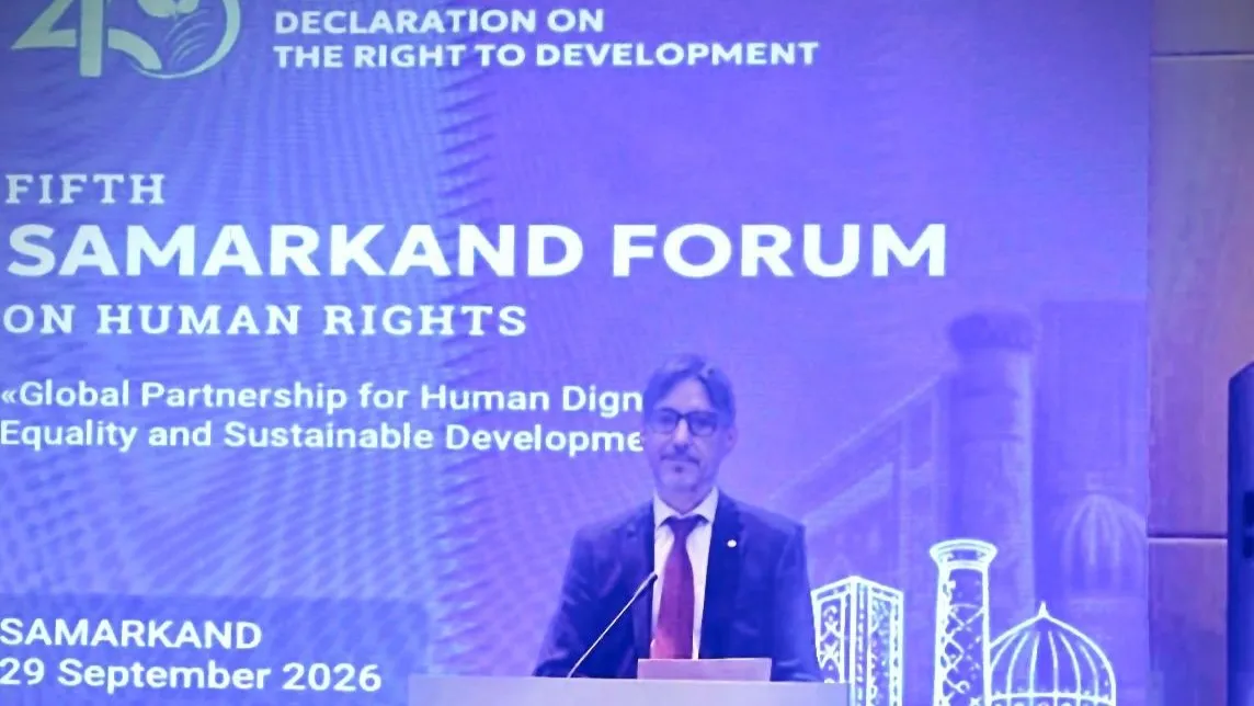 A speaker at a podium
