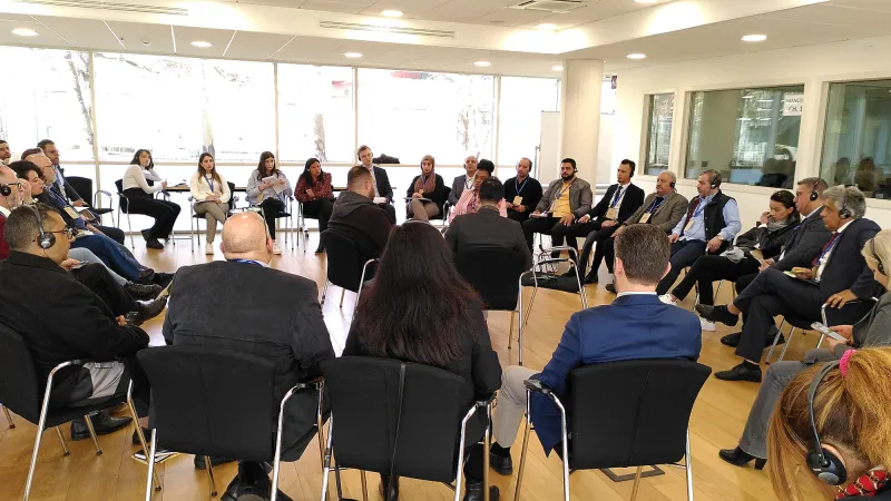 event participants sitting in a circle