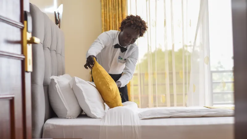 Poni Suzan a refugee from South Sudan working at the hotel