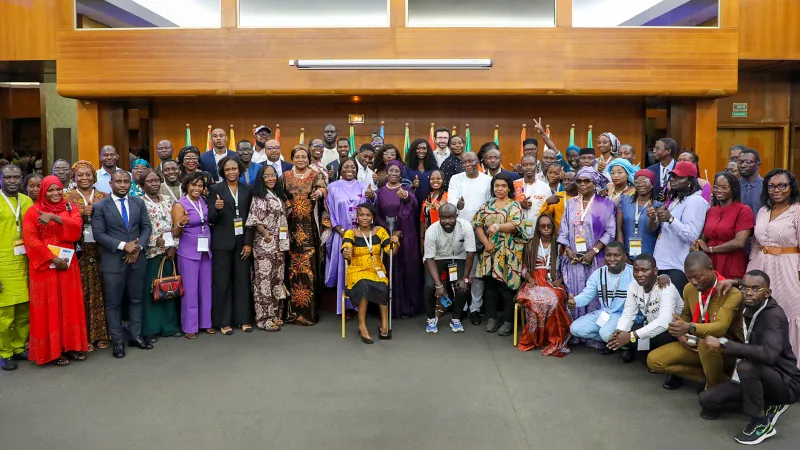 Group photo of around 70 participants at the closing of the 4th Annual West Africa and Sahel Youth Forum in Dakar, featuring young women and men, government officials, and partners standing and smiling together.